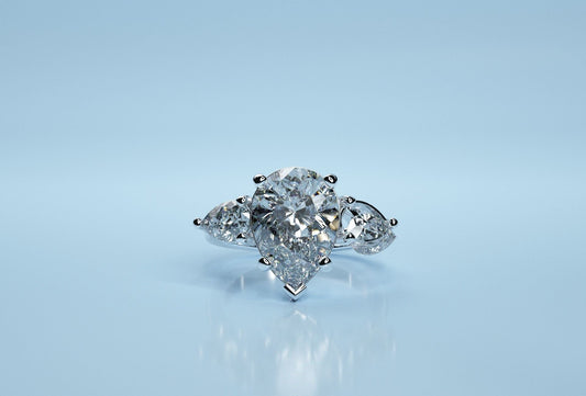 Pear diamond trio engagement ring