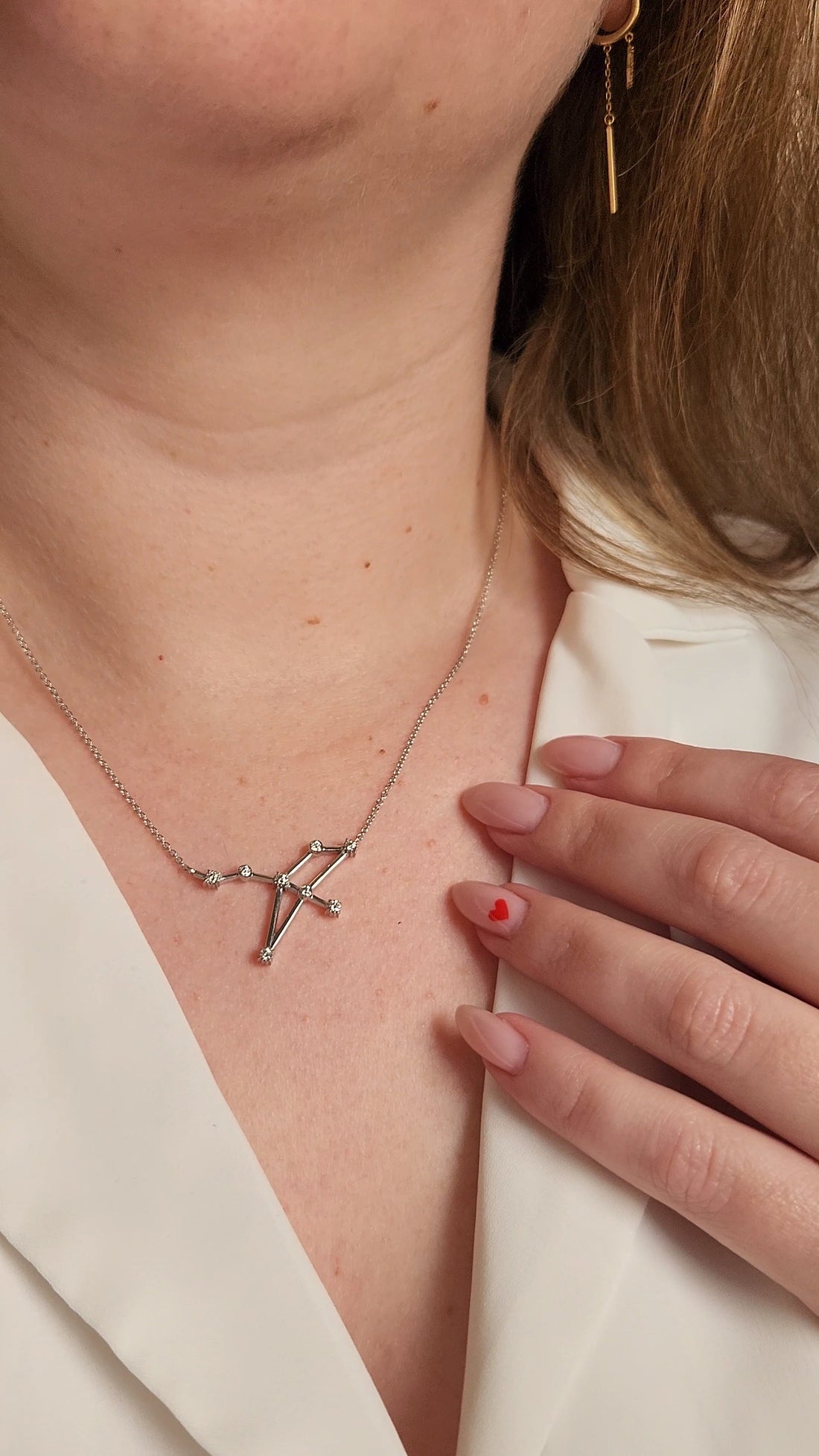 Constellation Necklace in 18K gold with natural diamonds set as a zodiac star pattern, celestial jewelry inspired by astrophysics