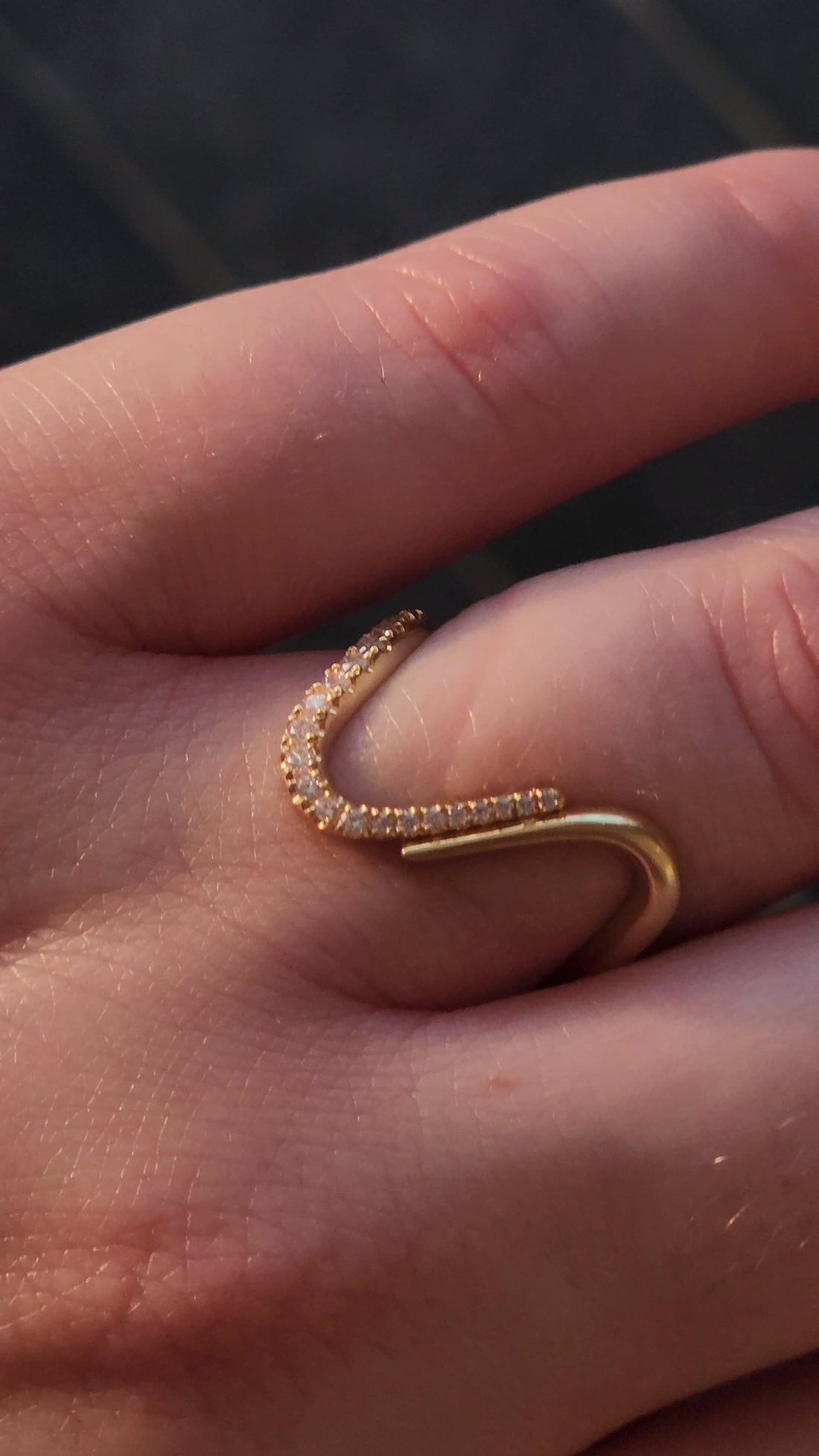 Wavy Diamond Ring in 18K recycled gold with natural diamonds worn on the finger, jewelry for the future minded Los Angeles woman