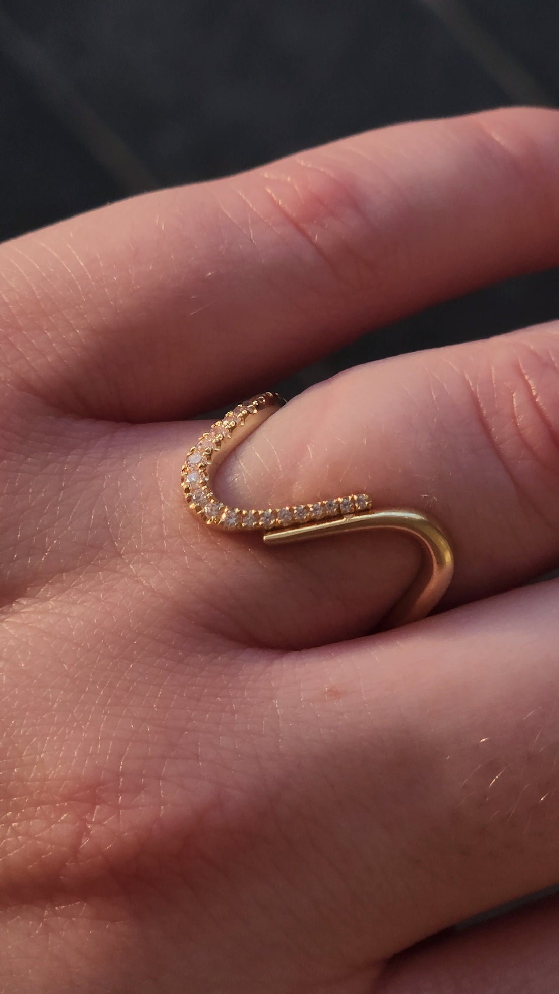 Wavy Diamond Ring in 18K recycled gold with natural diamonds worn on the hand