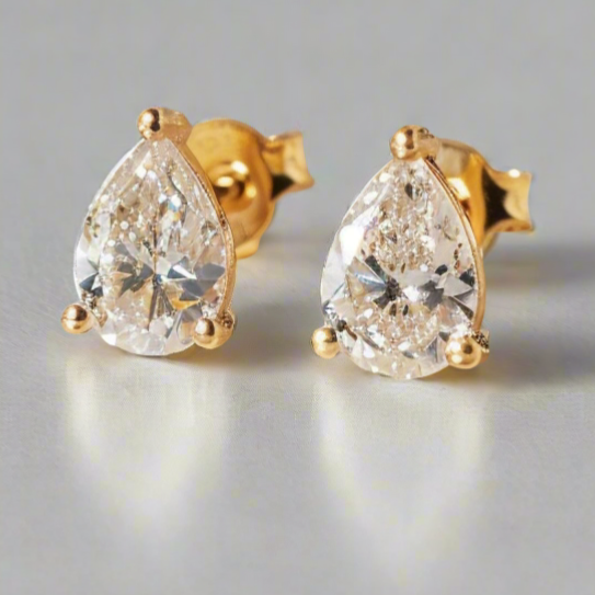 Pear stud diamond earrings 18k gold